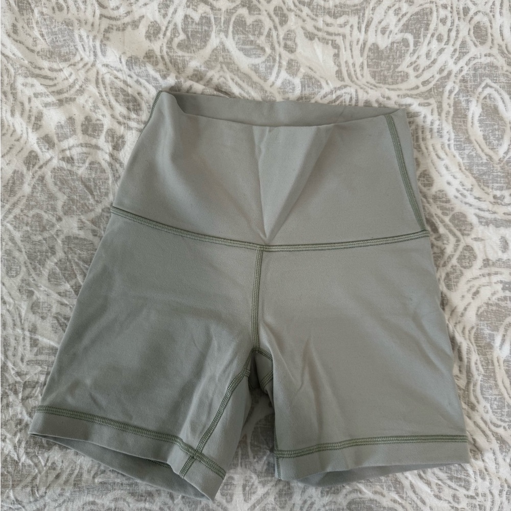aritzia tna action sage green 5” cheeky hi-rise shorts